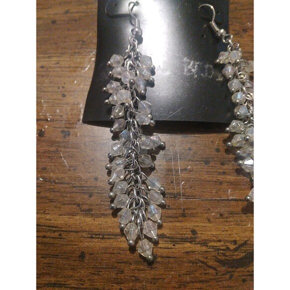 International Inspiration Silver Tone Dangle Chain With Irradesant Bead Earrings - Picture 2 of 2